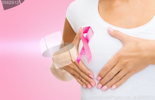 Image of woman with pink cancer awareness ribbon