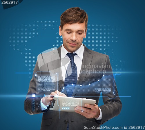 Image of buisnessman with tablet pc