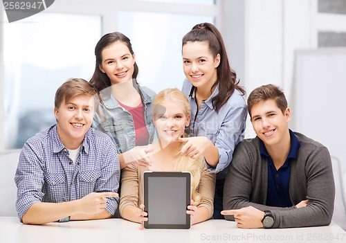 Image of smiling students with blank tablet pc screen