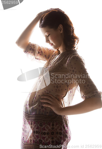 Image of silhouette picture of pregnant beautiful woman