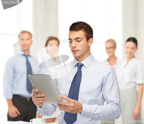 Image of buisnessman with tablet pc