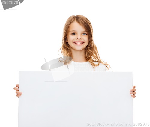 Image of smiling little girl with blank white board