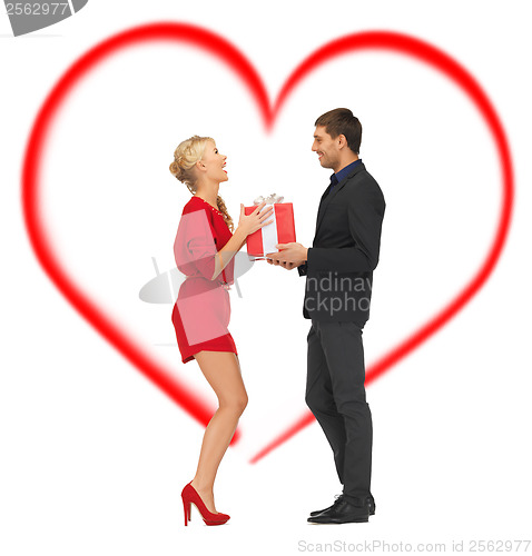 Image of romantic couple with gift box