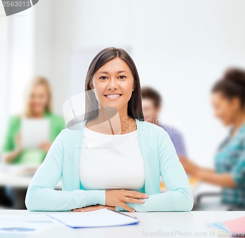 Image of international student studying in college