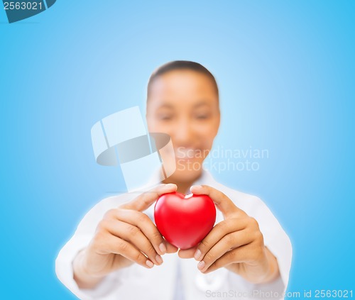 Image of woman hands with heart