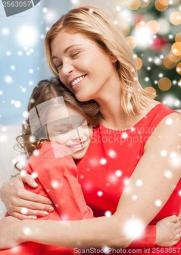 Image of hugging mother and daughter