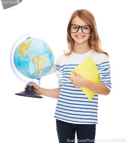 Image of smiling child with globe, notebook and eyeglasses