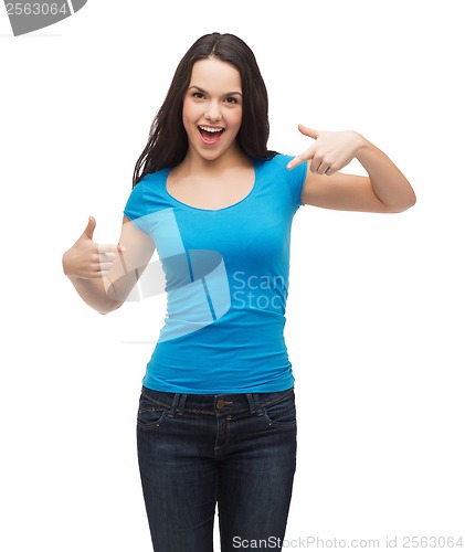 Image of smiling girl in blank blue t-shirt