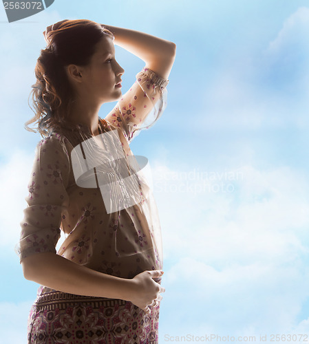 Image of silhouette picture of pregnant beautiful woman