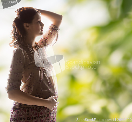 Image of silhouette picture of pregnant beautiful woman