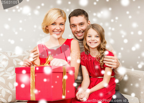 Image of happy family opening gift box