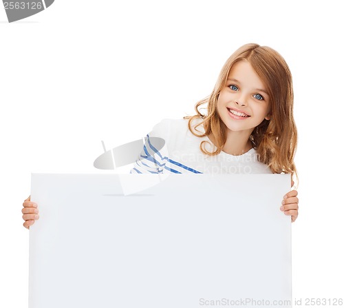 Image of smiling little girl with blank white board