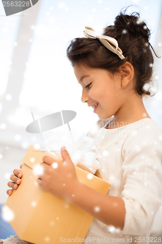 Image of happy child with gift box