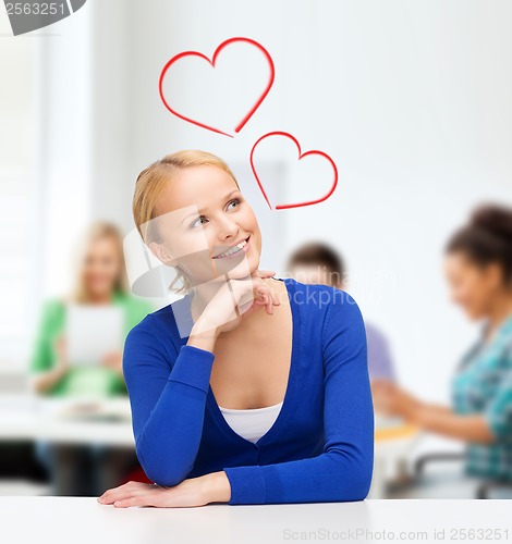 Image of happy woman dreaming