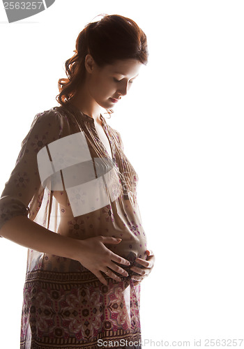 Image of silhouette picture of pregnant beautiful woman