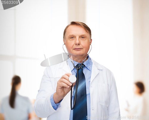 Image of smiling doctor or professor with stethoscope