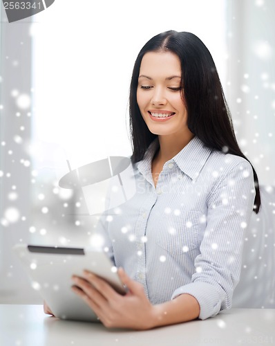 Image of smiling businesswoman or student with tablet pc
