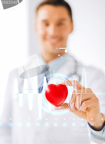 Image of male doctor with heart and cardiogram