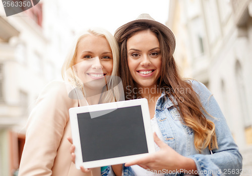 Image of beautiful girls with blank tablet pc screen