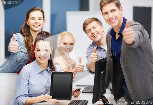 Image of students with monitor and blank tablet pc screen