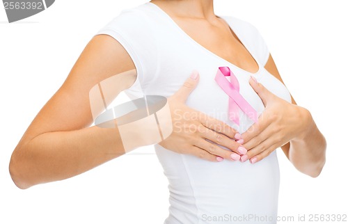 Image of woman with pink cancer awareness ribbon