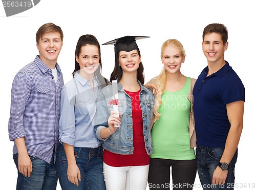 Image of group of standing smiling students with diploma