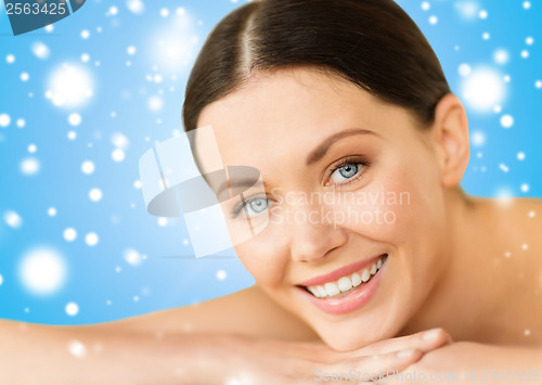 Image of beautiful smiling woman in spa salon