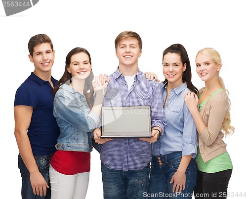 Image of smiling students with laptop computer