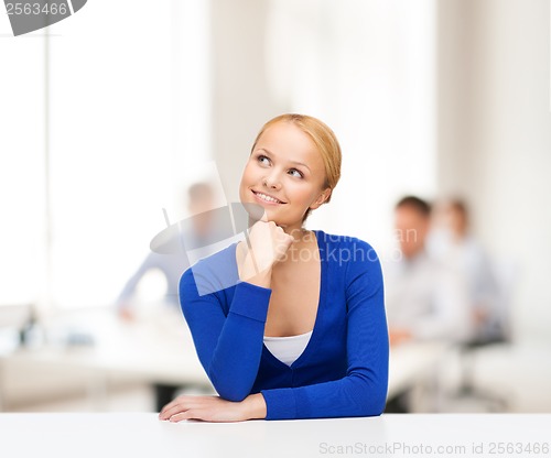 Image of happy woman dreaming