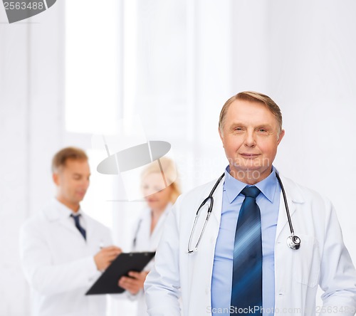 Image of smiling doctor or professor with stethoscope