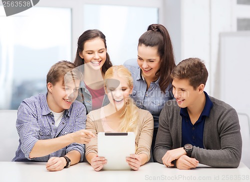 Image of smiling students with tablet pc at school