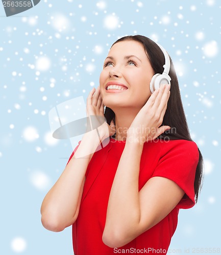 Image of smiling woman with headphones