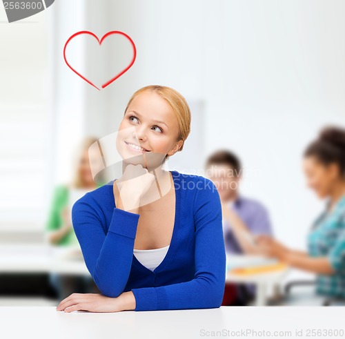 Image of happy woman dreaming