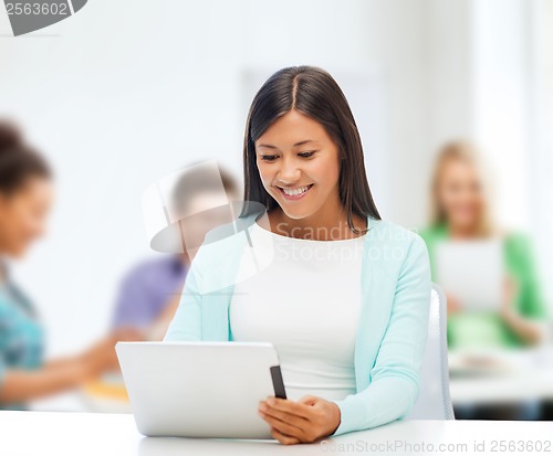 Image of businesswoman or student with tablet pc