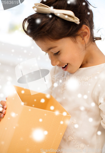 Image of happy child with gift box