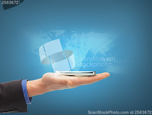 Image of man hand with smartphone and virtual world map