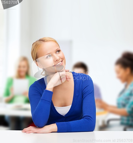 Image of happy woman dreaming