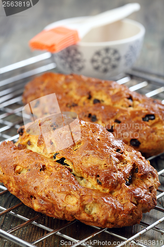 Image of Christmas stollen on the metal lattice.