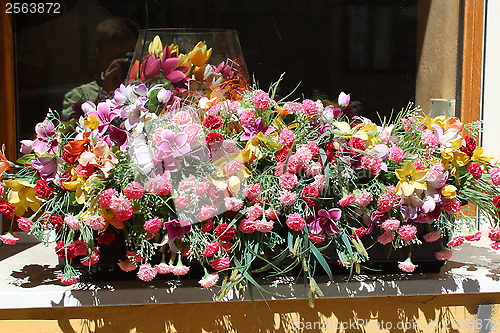 Image of beautiful flowers on the balcony