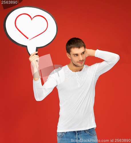 Image of pensive man with text bubble and heart in it