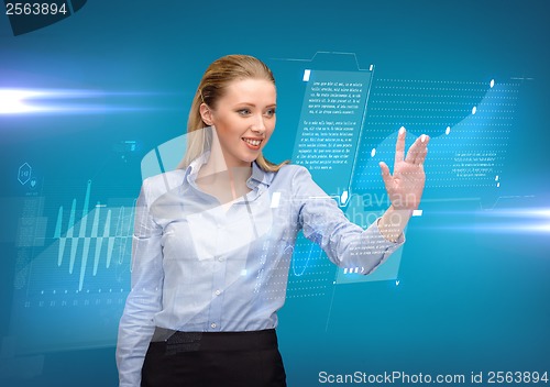 Image of woman working with imaginary virtual screen