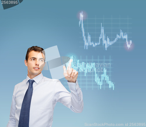 Image of man working with forex chart on virtual screen