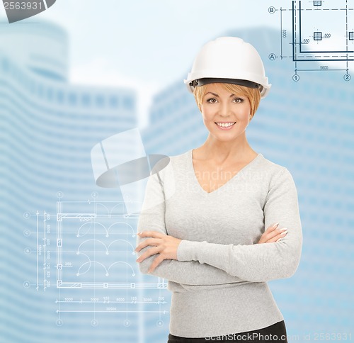 Image of female contractor in helmet