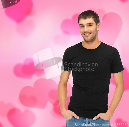 Image of man in black t-shirt