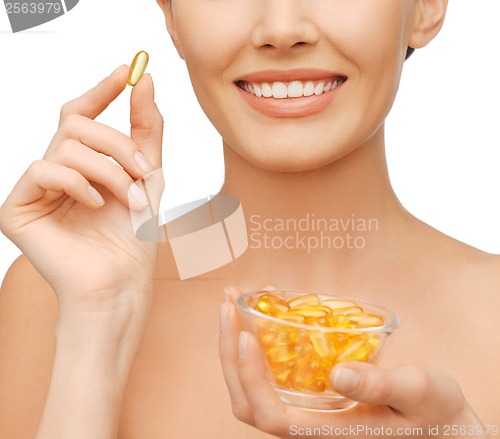 Image of beautiful woman with omega 3 vitamins