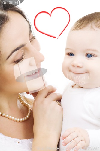 Image of smiling baby and mama
