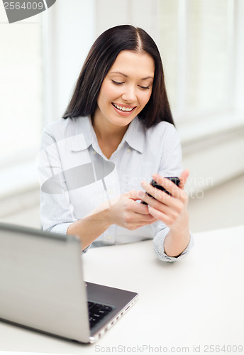 Image of smiling businesswoman or student with laptop