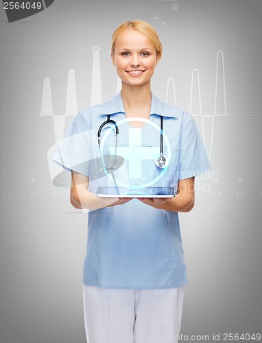 Image of smiling female doctor or nurse with tablet pc