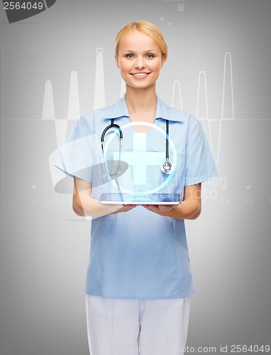 Image of smiling female doctor or nurse with tablet pc
