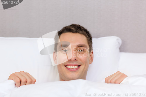 Image of handsome sleeping in bed